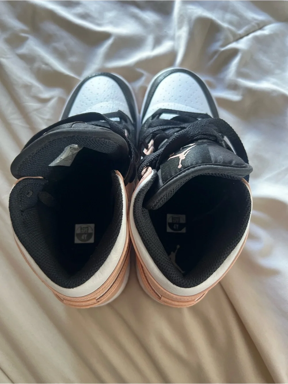 Nike Air Jordan 1 Mid Black, White & Peach Sneakers